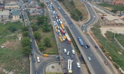 40-ft container falls off trailer on Otedola Bridge, crushes 2 cars, one dead