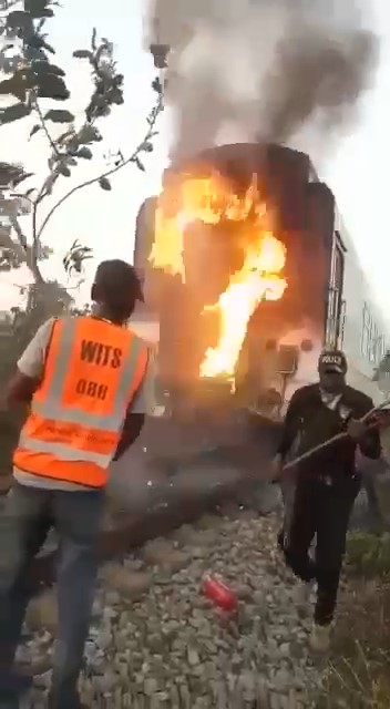 VIDEO: Railway staff fight train fire with leaves