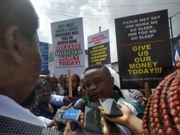 Musicians storm Access Bank, demand immediate release of COSON’s money