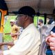 Obasanjo stuns Abeokuta residents, hits the road as ‘Keke’ rider