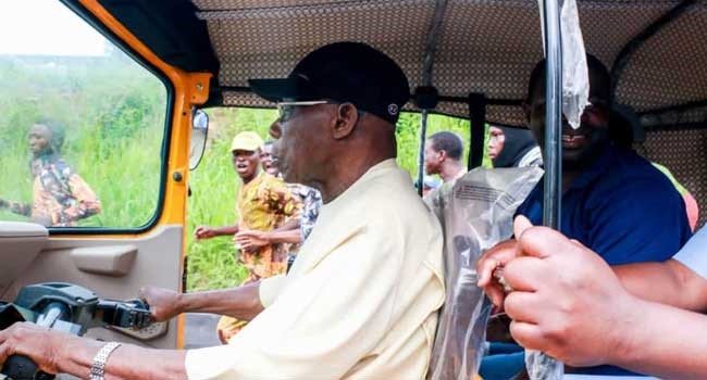 Obasanjo stuns Abeokuta residents, hits the road as ‘Keke’ rider