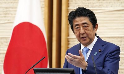 Japan mourns as body of assassinated PM Abe returns to Tokyo